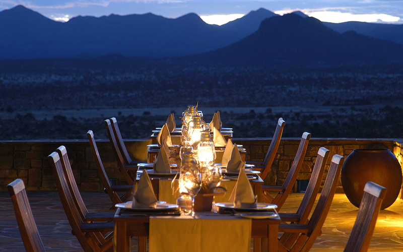 Luxury lodge dining at dusk